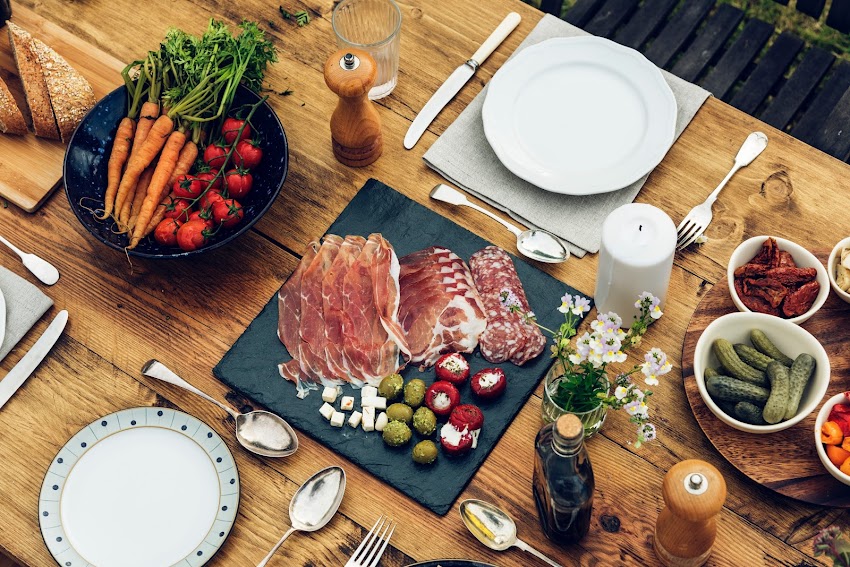 Silver Spoon and Forks Beside Vegetables Silver Spoon and Forks Beside Vegetables