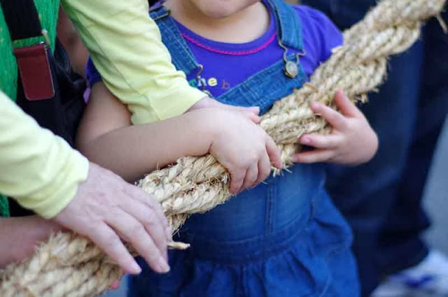 little hands on smaller rope, children participate