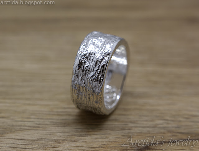 https://www.arctida.com/en/home/132-carved-massive-ring-with-tree-bark-texture-wide-band.html