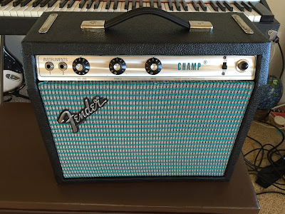 Beautifully restored Fender Champ amp front view