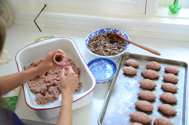 Shaping the kibbeh to be stuffed