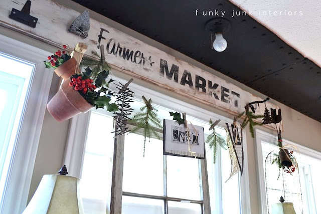 A natural Christmas garland window valance you can make in moments! https://www.funkyjunkinteriors.net/