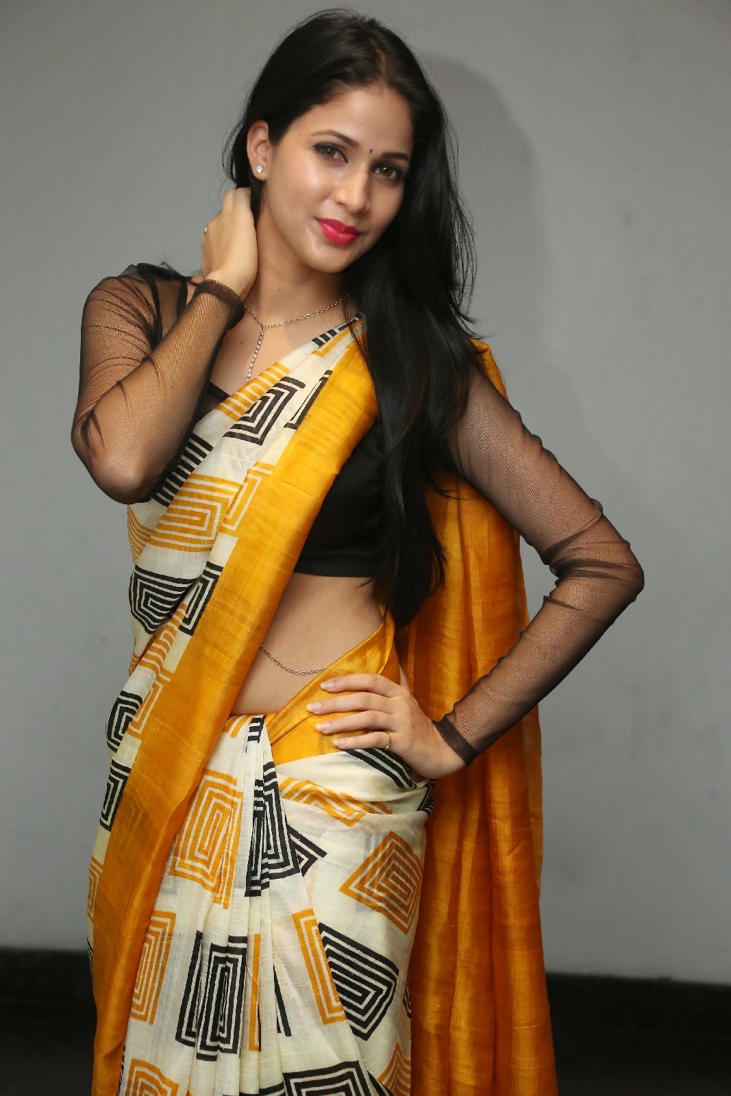 Actress Lavanya Tripathi Show Hot Hip in Yellow Saree.