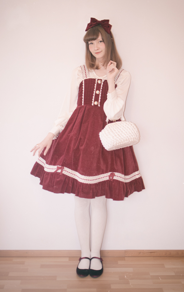 a finnish lolita posing in old school velvet metamorphose dress