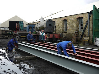 Painting girders for Houghwell Burn Bridge East Tanfield