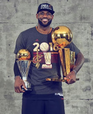 2 Lebron James, his wife & kids pose with his NBA championship trophies (photos)