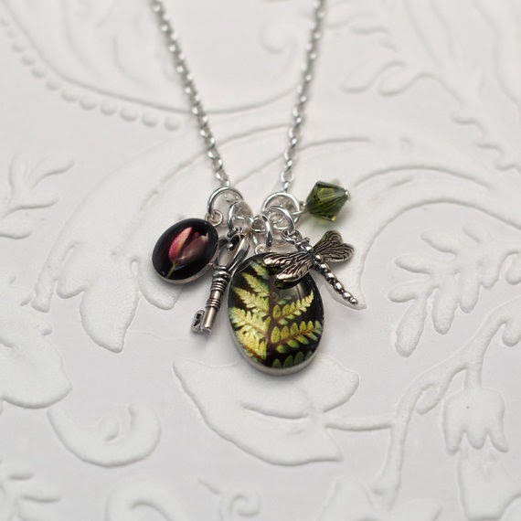 http://www.junehunter.com/collections/botanical-jewelry/products/secret-garden-charm-pendant-botanical-jewelry
