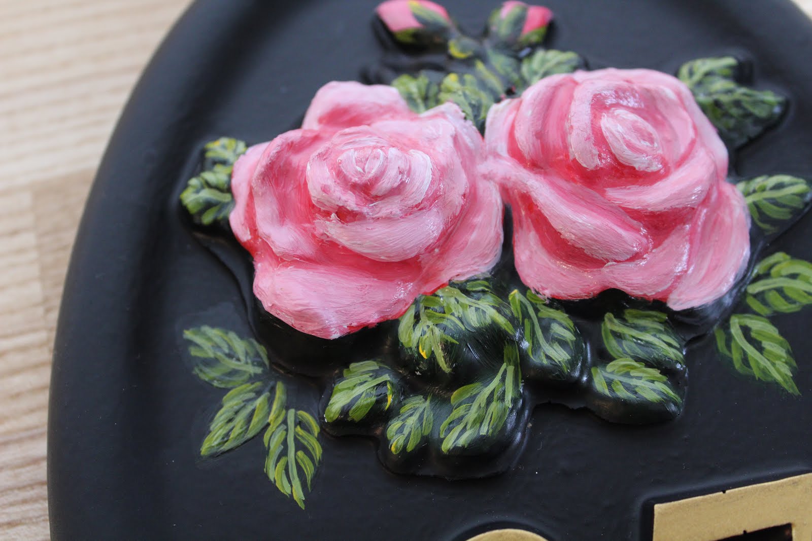 handpainted pink roses on house sign