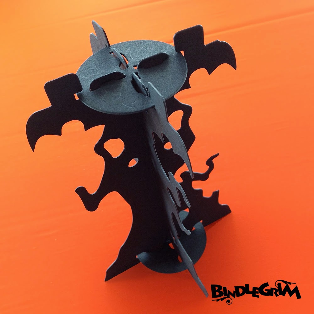 One view of the variety of branches that festoon the silhouette of this candlestick base, part of the Spooklights by Bindlegrim