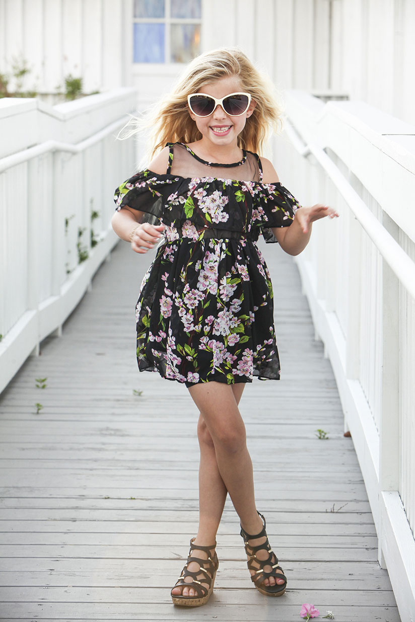 Little Edge Threads. Affordable fashion for stylish kiddos. Little girl in floral tunic