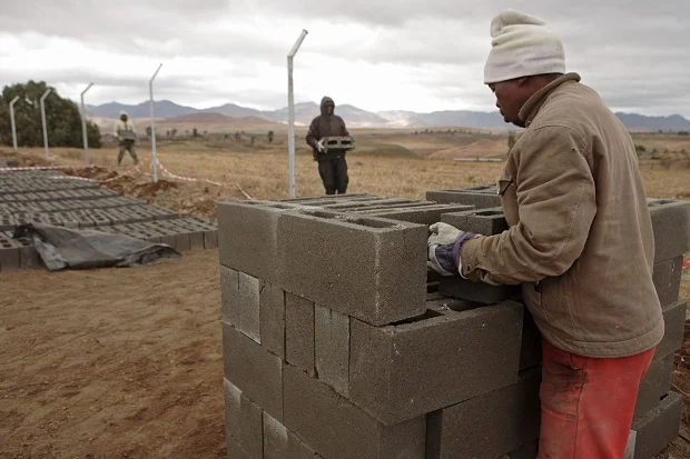 Africa Southern Lesotho metolong dam toilets brick making