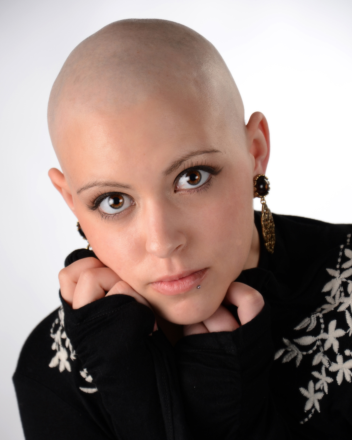 Starting chemo this past spring, Hannah underwent treatments every two week...