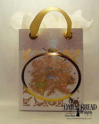 Our Daily Bread Designs, Card Caddy and Gift Bag Die,  Double Stitched Oval dies,  Oval Stitched Rows Dies, Poinsettia Inset Dies,  Gift Bag Handles and Toppers Die and Noel Ornaments stamp set.  