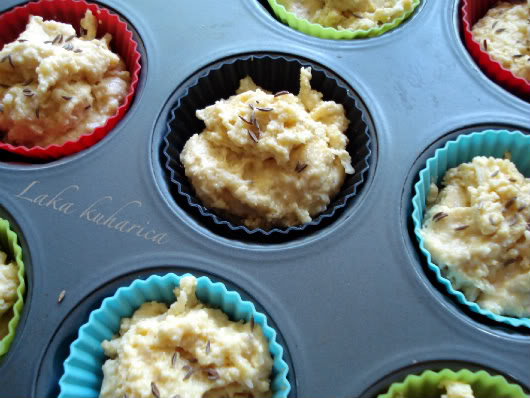Divide the batter among 12 buttered muffin tins