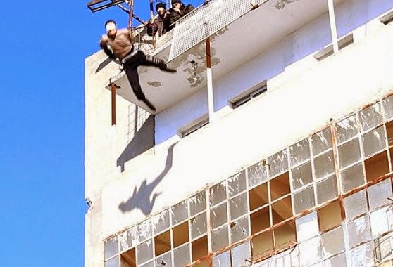 article 2978890 264E37EA00000578 Graphic photos: ISIS militants throw 'gay' man off building in Raqqa