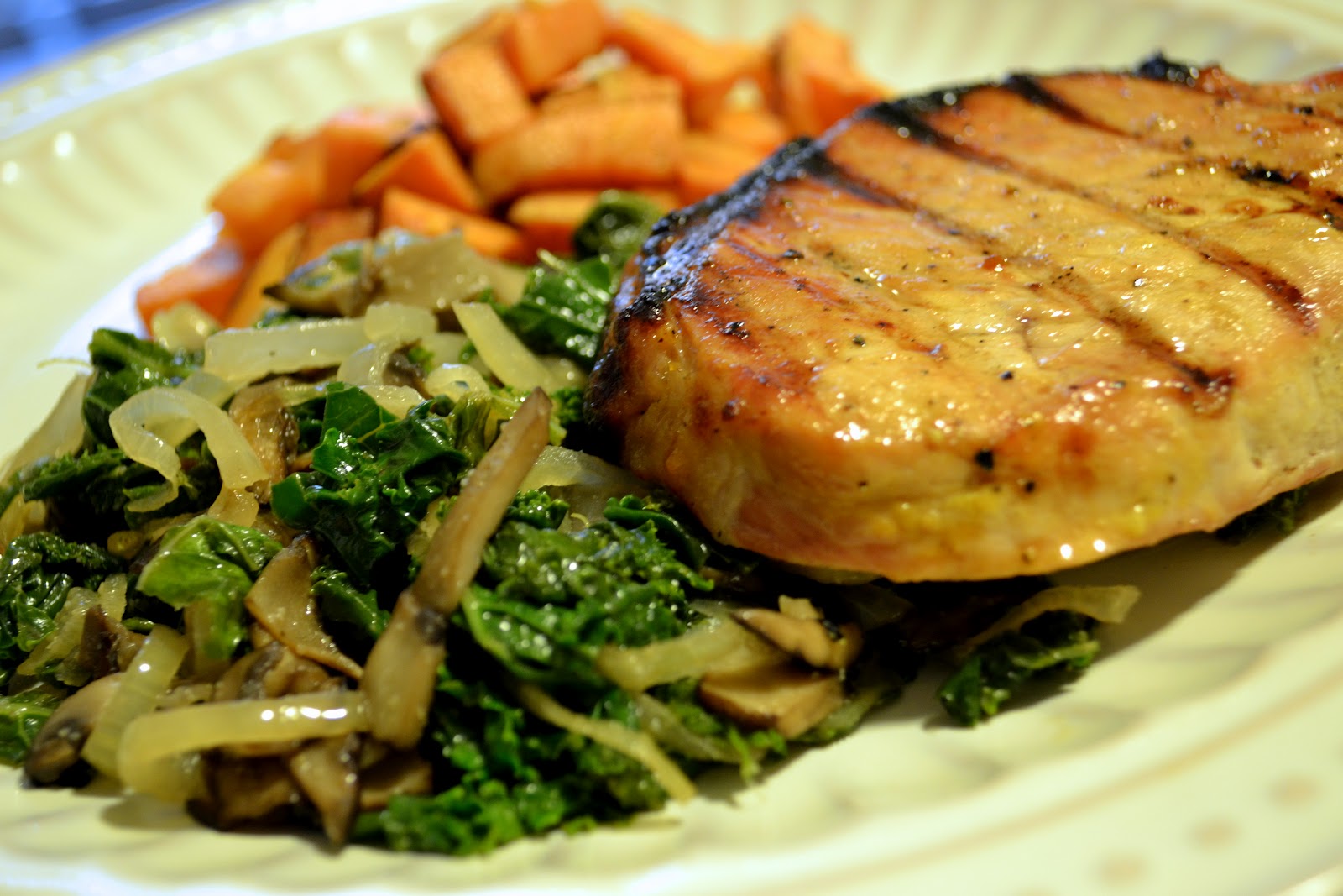 Paleo & Wine Raw Honey & Mustard Glazed Pork Chops with a Kale and