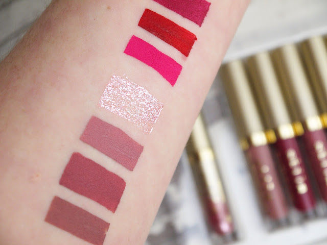 stila stay all day liquid lipstick swatch, stila glitterati transcend swatch swatches of stila liquid lipsticks and lip glitter on my arm