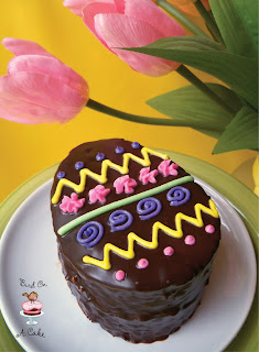 http://birdonacake.blogspot.com/2013/03/chocolate-easter-egg-mini-cakes.html