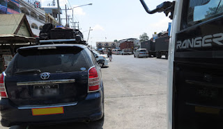 Myanmar Cars waiting at Thai border crossing Myanmar Cars waiting at Thai border crossing