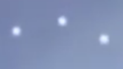 Here's a close up image of the three white Orbs following the larger UFO in Chilean air space.