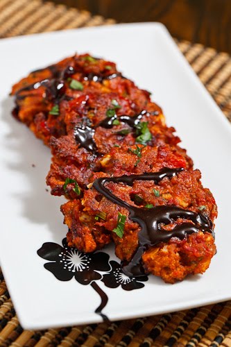Roasted Red Pepper and Feta Fritters drizzled with Balsamic Syrup Roasted Red Pepper and Feta Fritters drizzled with Balsamic Syrup