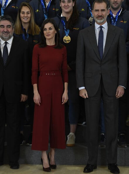 Queen Letizia wore Hugo Boss Trima cropped wide-leg trousers and Hugo Boss Frankie cuff-detail wool sweater. King Felipe and Queen Letizia