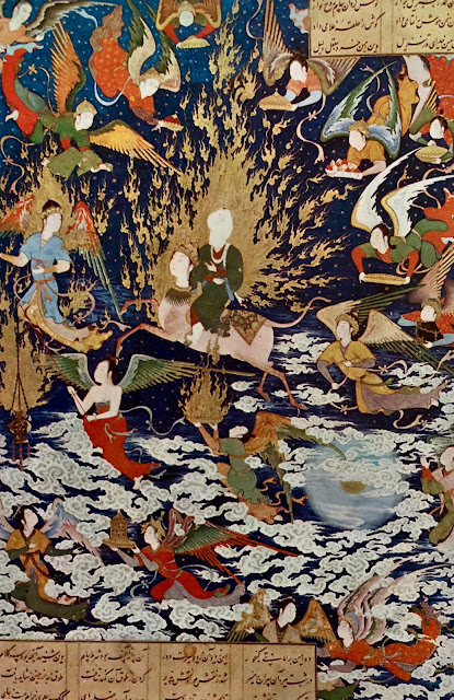 The Prophet in a magnificent flaming halo, is shown riding Burak, the fantastic human-faced horse-like creature, surrounded by angels ascending through the clouds of a starry sky to the Seven Heavens in the Night Journey that brings Him to see the Pleasures of Paradise and the Punishments of Hell. Tabriz 16th century