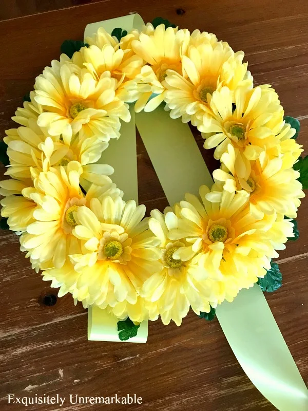 Yellow Floral Candle Ring on table