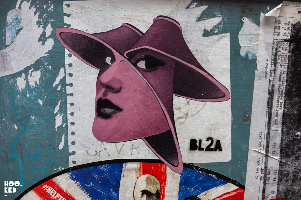 Shoreditch Street Art, wheat pasted posters in London.