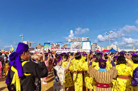 festival surrounding tug-o-war, costumes