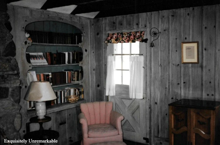 Paneled Living Room with books on shelves