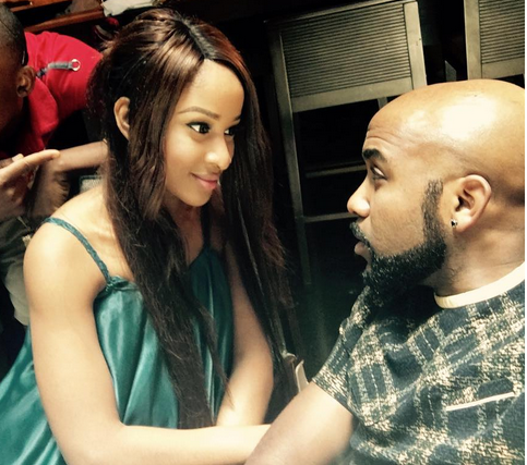 Banky W and fiancee Adesua Etomi stare intensely at each other