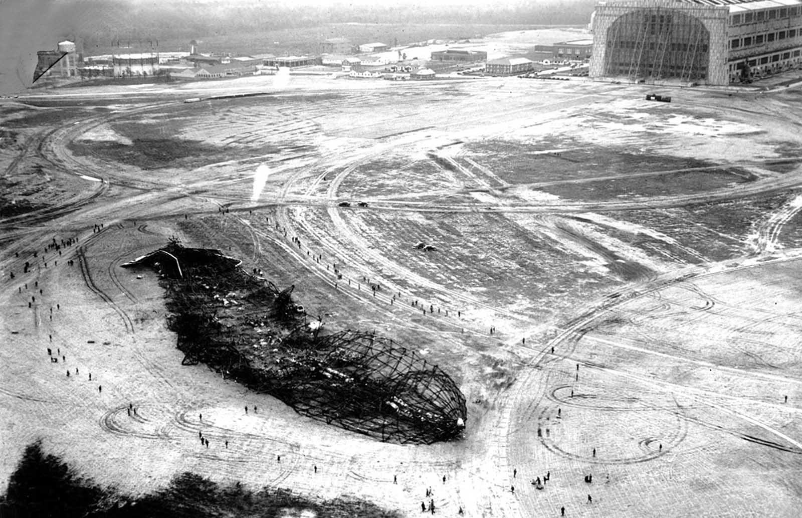 An aerial view of the wreckage of the Hindenburg airship near the hangar at the Naval Air station in Lakehurst, New Jersey, on May 7, 1937.