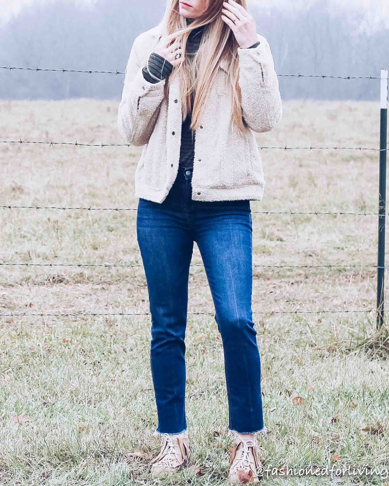 sherpa jacket outfit with cropped jeans and fringe moccasins 