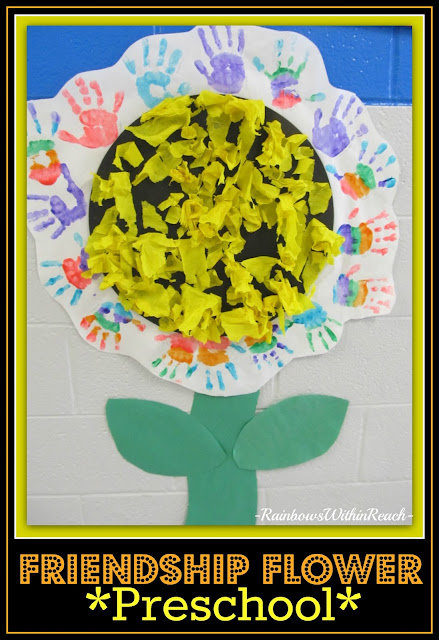 photo of: Class Mural Collaboration of Individual Handprint paintings creating a Sunflower in Bloom.