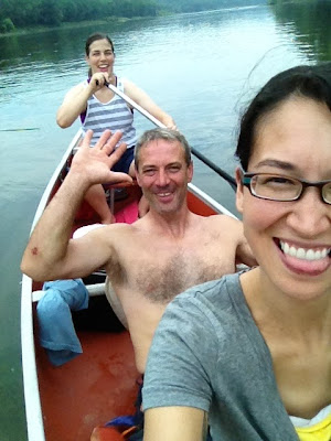 All smiles on the canoe (I'm in the striped shirt)