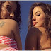 La mannequin Ashley Graham expose ses fesses en gros plan lors d'un moment à la plage