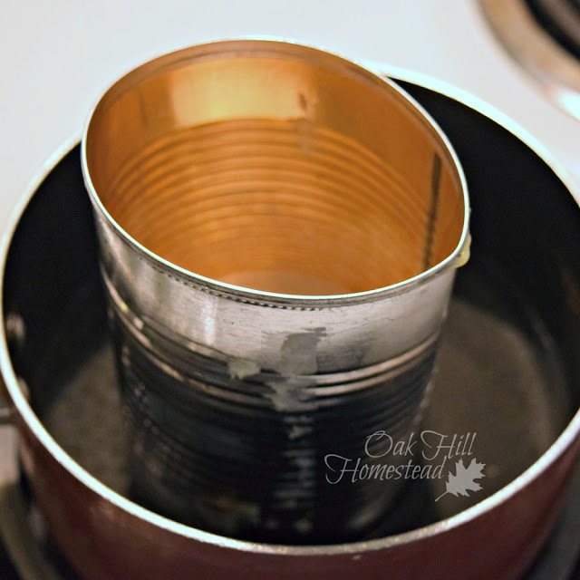 Melt the oils in a DIY "double boiler".