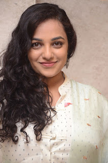 nitya menon at 100 days of love audio launch nitya menon at 100 days of love audio launch