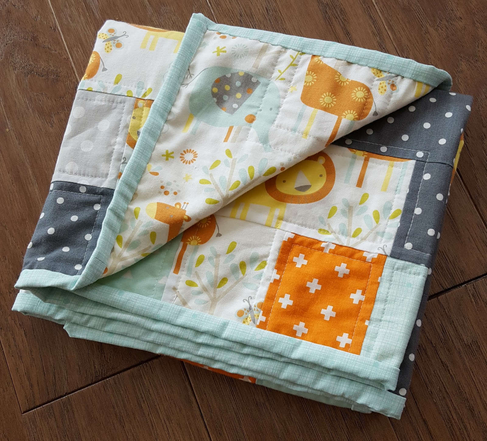 The Domestic Engineer Colorful Cross Baby Quilt (An Easy Way to Match