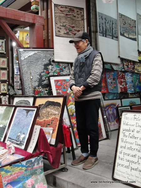 woodcut artist Ding Ji Tang in Muslim Quarter in Xi'an, China