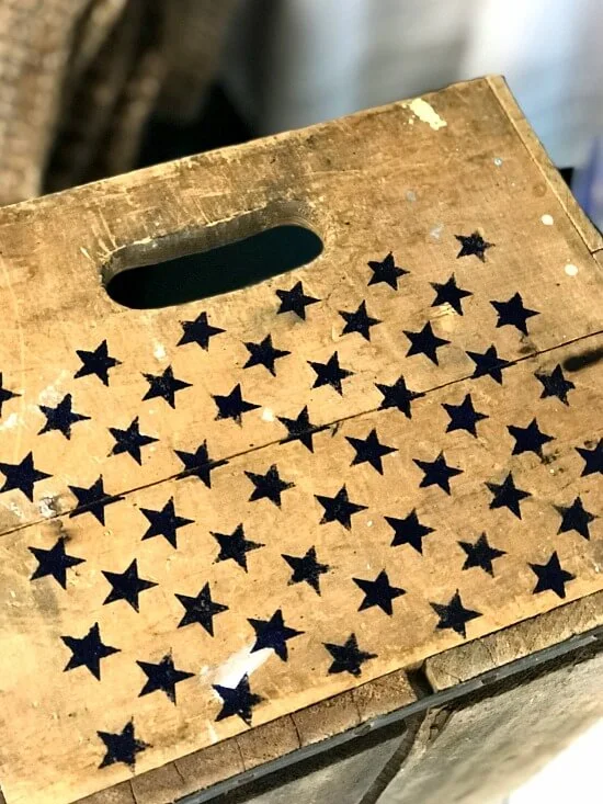 Star stencils on an antique crate