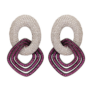 Elegant Earrings curated in 18 K Gold finished in black polish and set with Rubies and Diamonds in an invisible setting by Tanya Rastogi Elegant Earrings curated in 18 K Gold finished in black polish and set with Rubies and Diamonds in an invisible setting by Tanya Rastogi