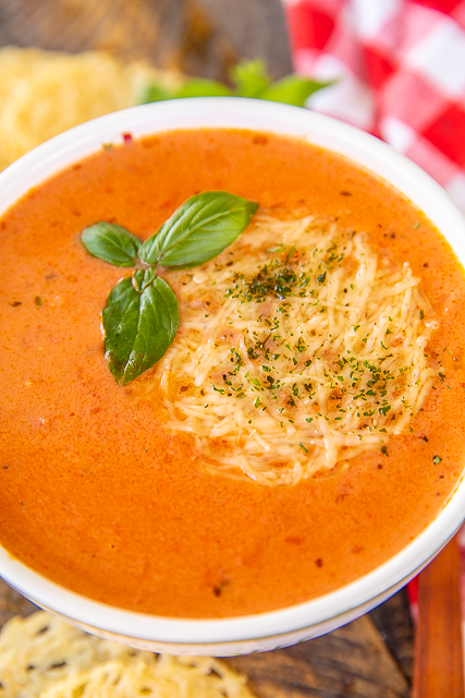 Creamy Tomato Soup - grown up version of my favorite soup as a kid. Shallot, butter, garlic, oregano, red pepper flakes, tomato juice, crushed tomatoes, chicken base, sugar, heavy cream, salt and pepper. We served the soup with some yummy parmesan crisps. Also delicious leftover! #soup #tomatosoup #quick Creamy Tomato Soup - grown up version of my favorite soup as a kid. Shallot, butter, garlic, oregano, red pepper flakes, tomato juice, crushed tomatoes, chicken base, sugar, heavy cream, salt and pepper. We served the soup with some yummy parmesan crisps. Also delicious leftover! #soup #tomatosoup #quick