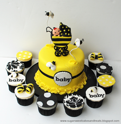 Bumble Bee designed cake with stroller topper, buzziny bees and matching cupakes