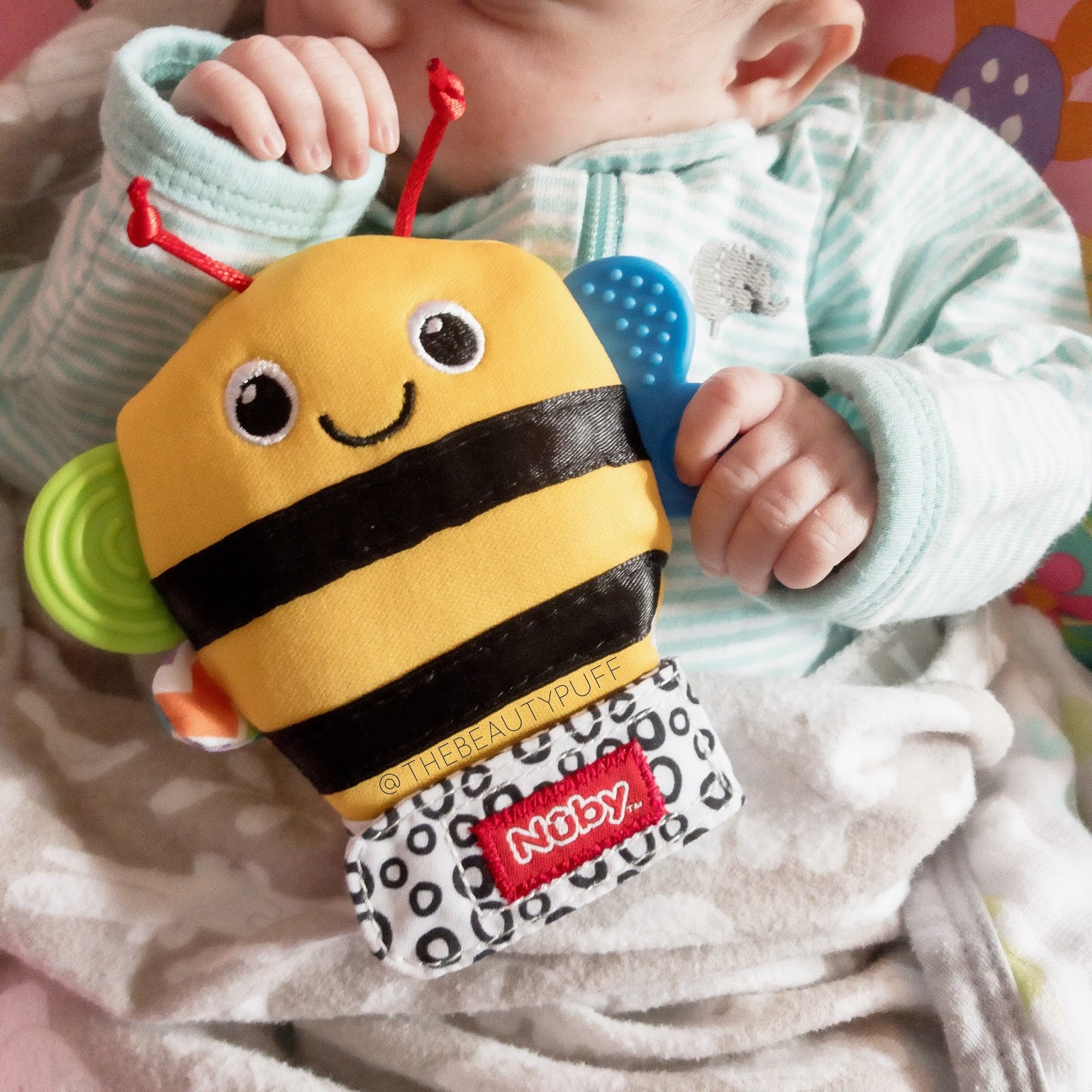 nuby happy handimals teething mitten