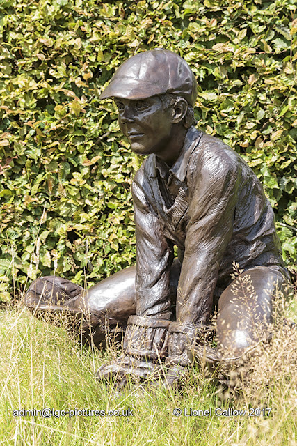 Wicket Keeper by Judith Drewry This is an almost life size sculpture of a young boy keeping wicket in bronze