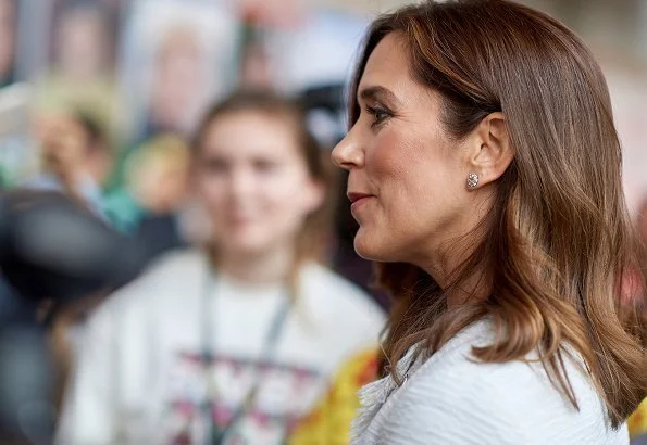 Crown Princess Mary wore a Hugo Boss White Tweed Fringe Collarless Jacket, carried Prada bag