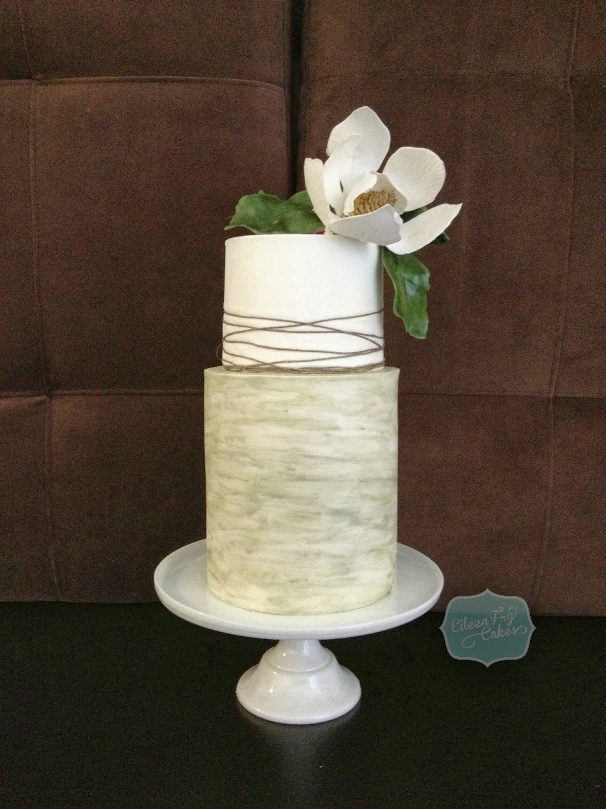 Eileen Fry Cakes Double barrel twine cake with magnolia flower