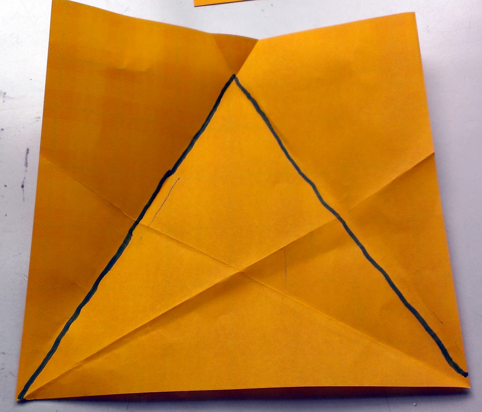 Slightly Surreal How to Fold an Equilateral Triangle